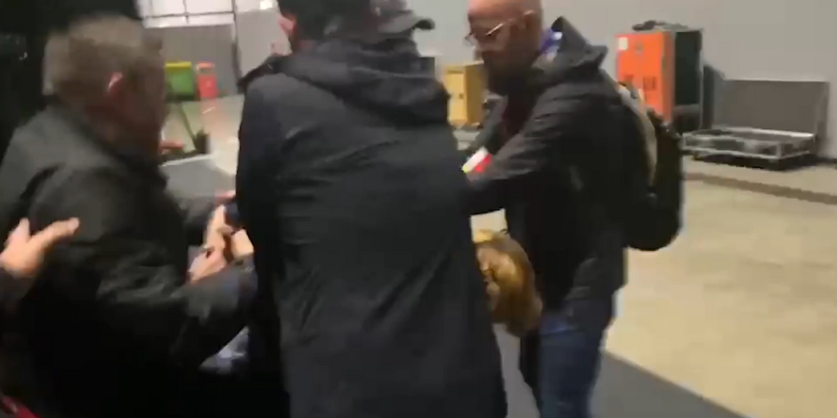 NextImg:WATCH: Shocking moment Labour conference protester is dragged into backroom by security