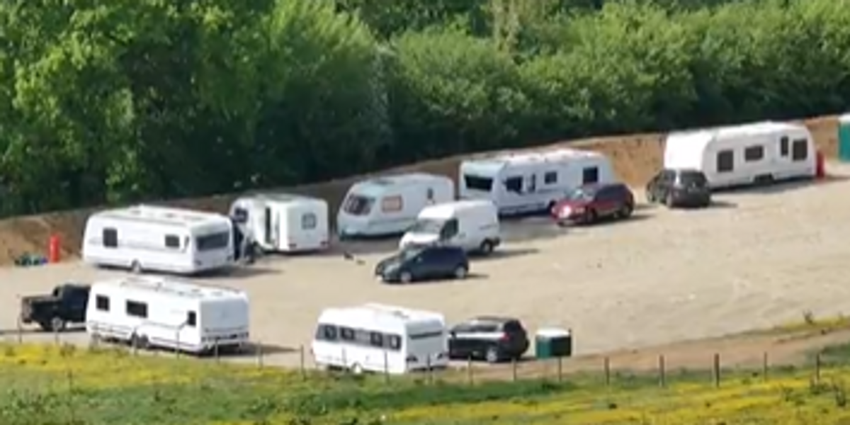 NextImg:Neighbour row erupts as travellers take over huge field with fleet of caravans