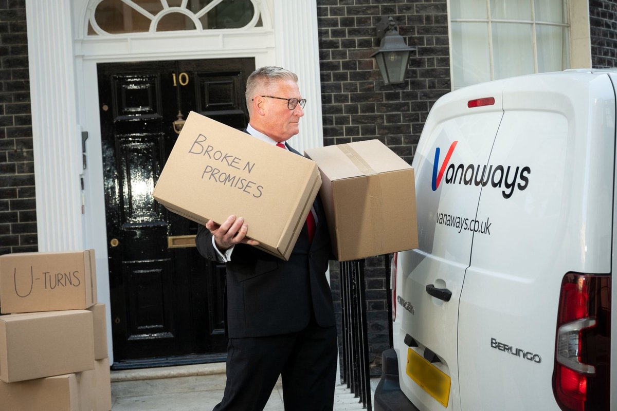 A lookalike of Sir Keir Starmer was spotted outside of No 10 with moving boxes in a jab at the Prime Minister
