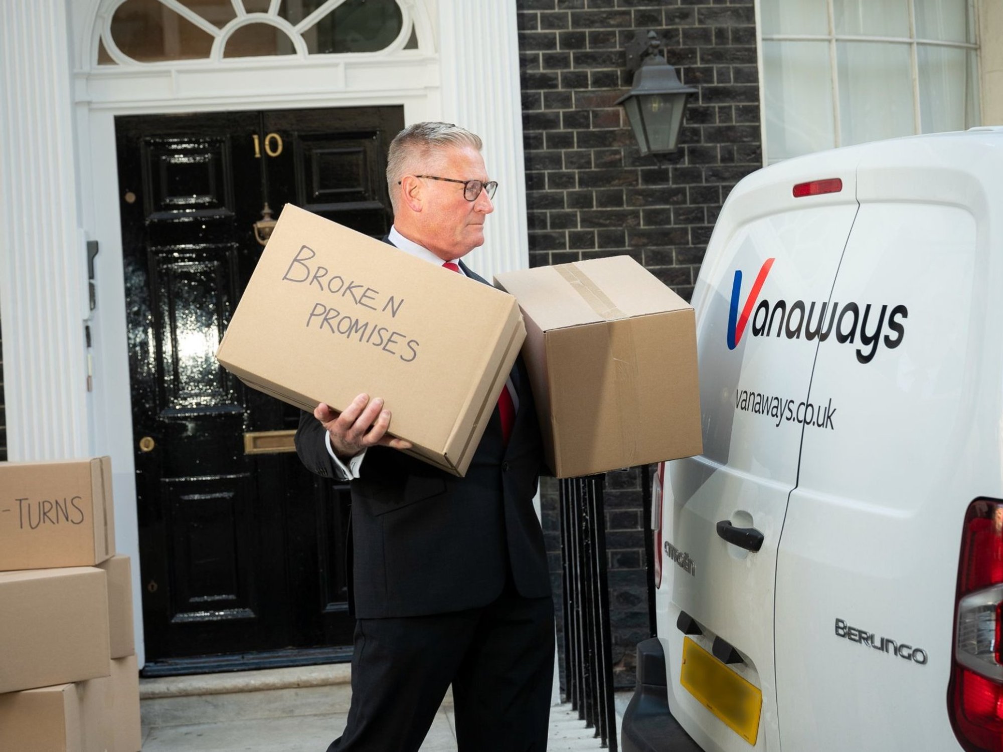 A lookalike of Sir Keir Starmer was spotted outside of No 10 with moving boxes in a jab at the Prime Minister