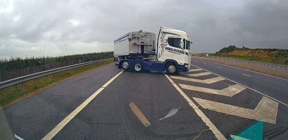 A lorry driving the wrong way down on a slip road on the A90 underpass