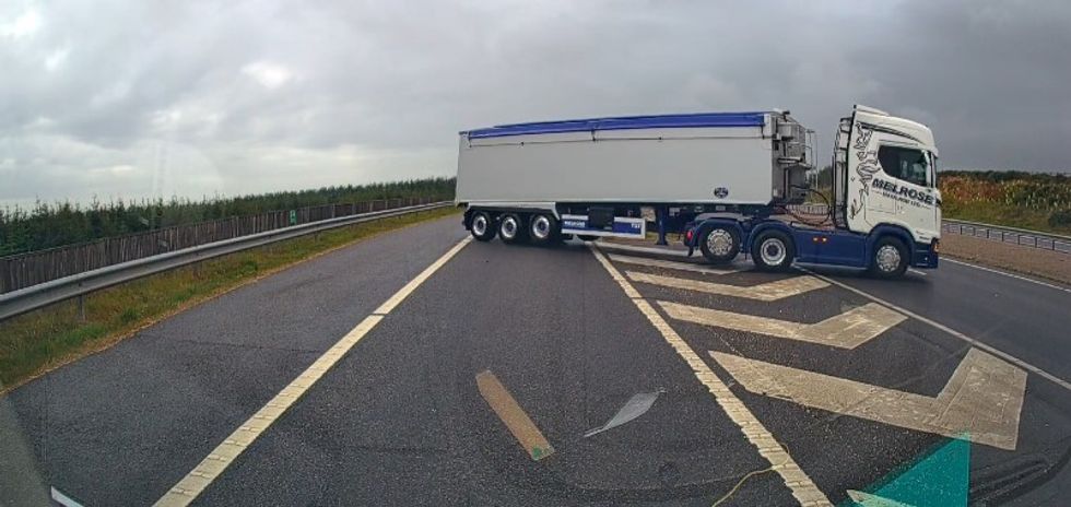 A lorry driving the wrong way down on a slip road on the A90 underpass