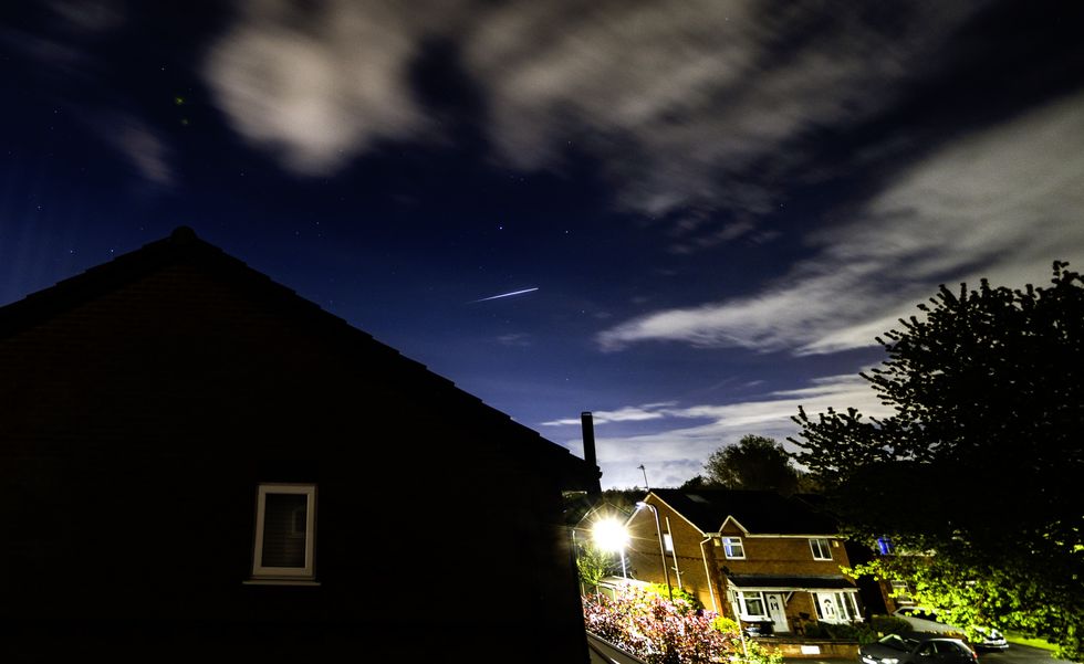 A Lyrid Meteor is seen in the sky above Lee Park in Liverpool