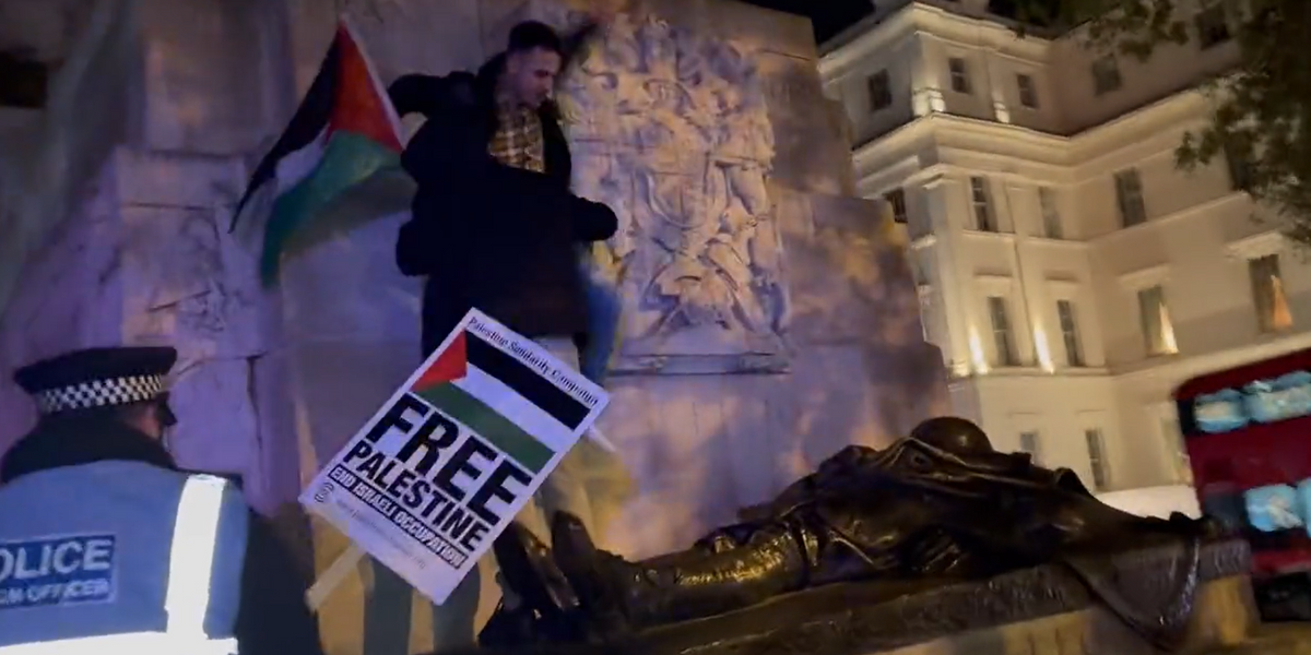 NextImg:Pro-Palestine activist sparks outrage after climbing London war memorial - and police say there's nothing they can do