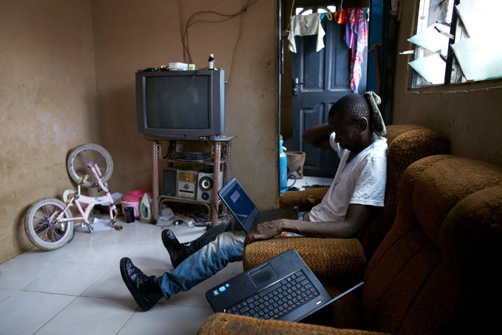 A man on his laptop in Accra, Ghana