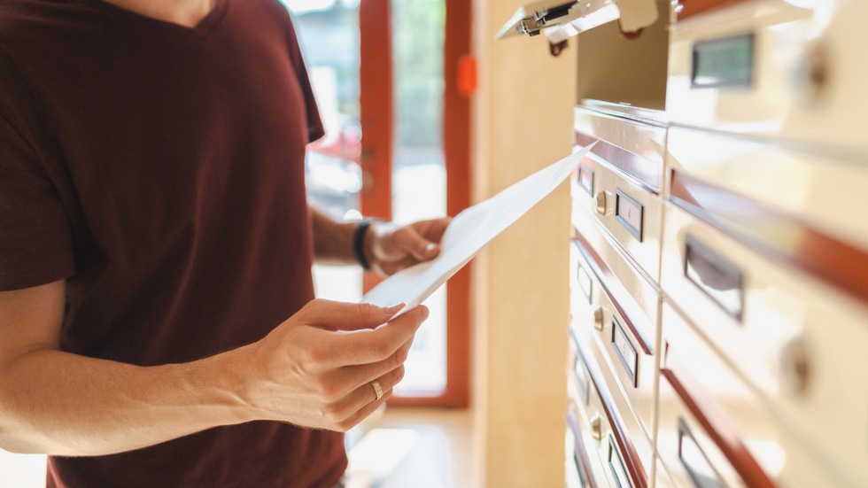 A man reads a letter