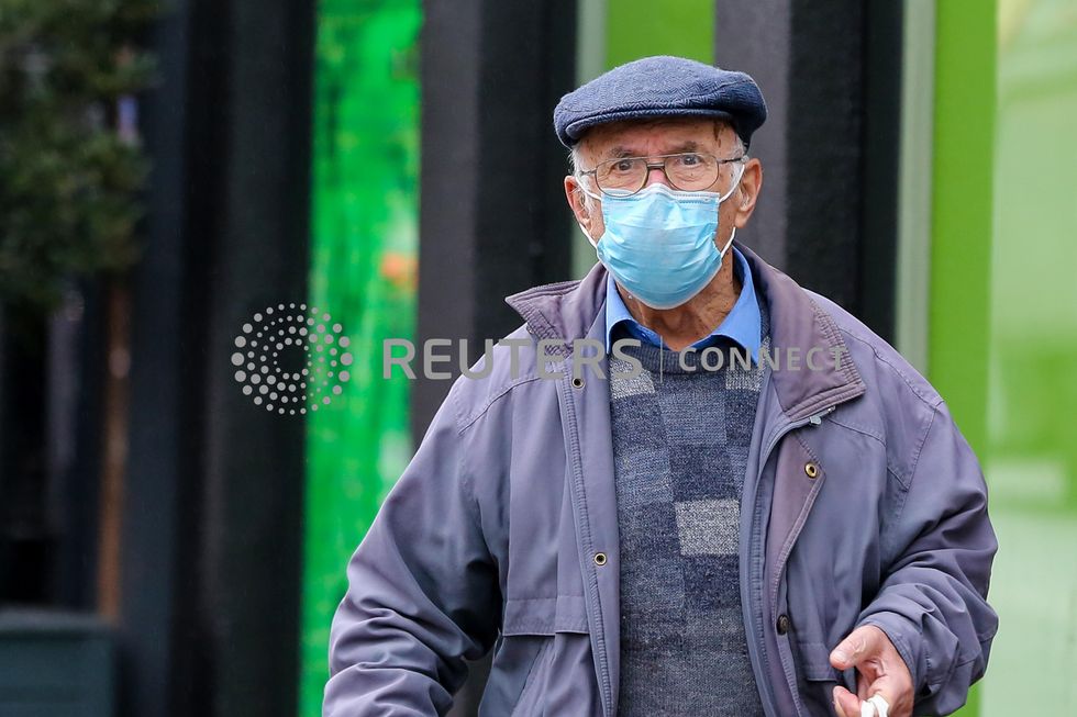 A man seen wearing a face mask as a precaution against the spread of covid-19. Mandatory face masks came into force in shops in England to limit the spread of the Omicron variant. (Photo by Dinendra Haria / SOPA Images/Sipa USA)No Use Germany.