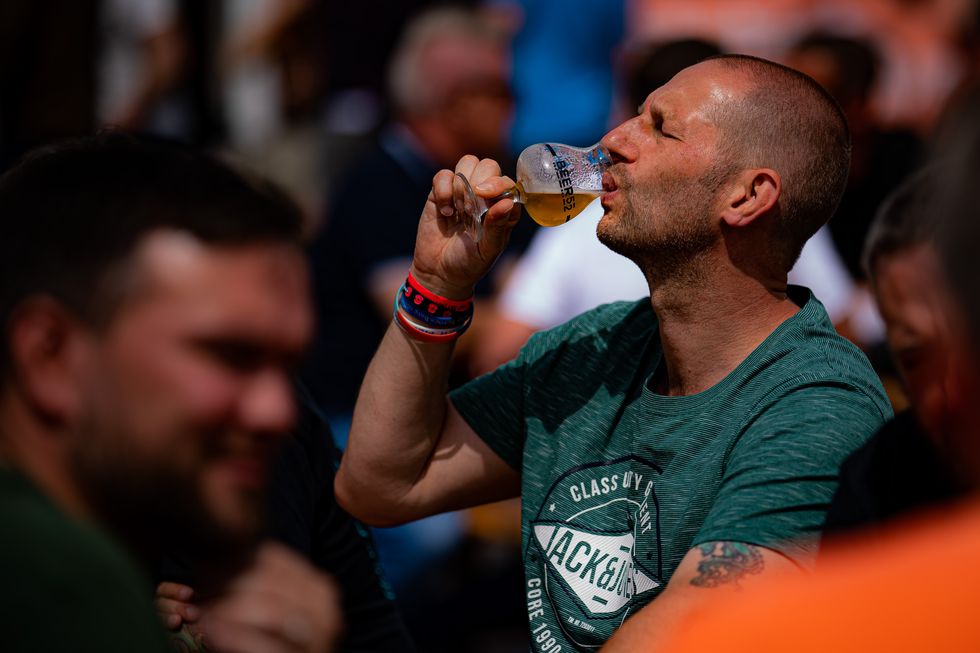 A man takes a drink at the Bristol Craft Beer Festival.