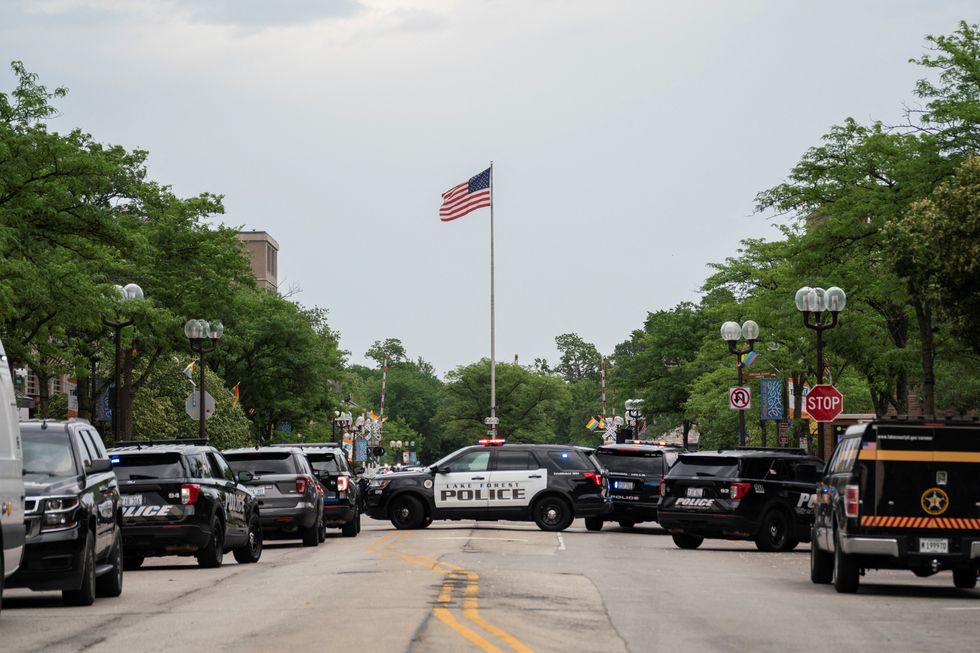 A man who was arrested following the mass shooting at a July 4 parade in Chicago has been identified as verified Spotify artist Awake The Rapper.
