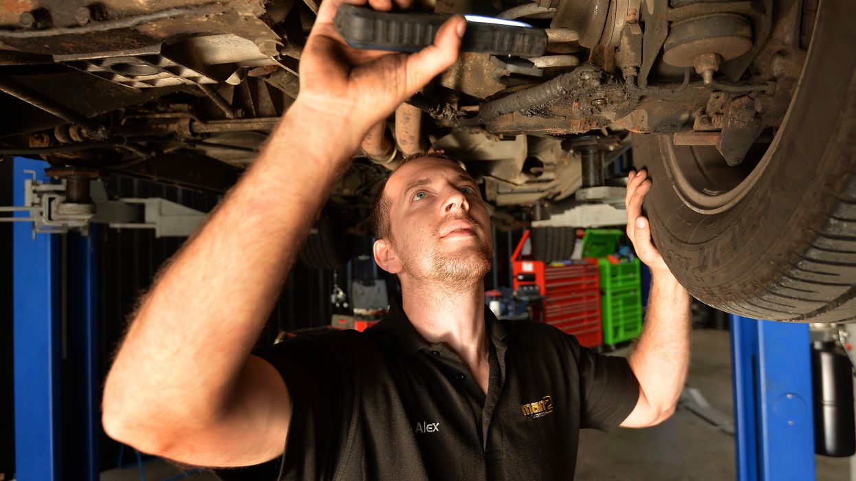 A mechanic doing an MOT test