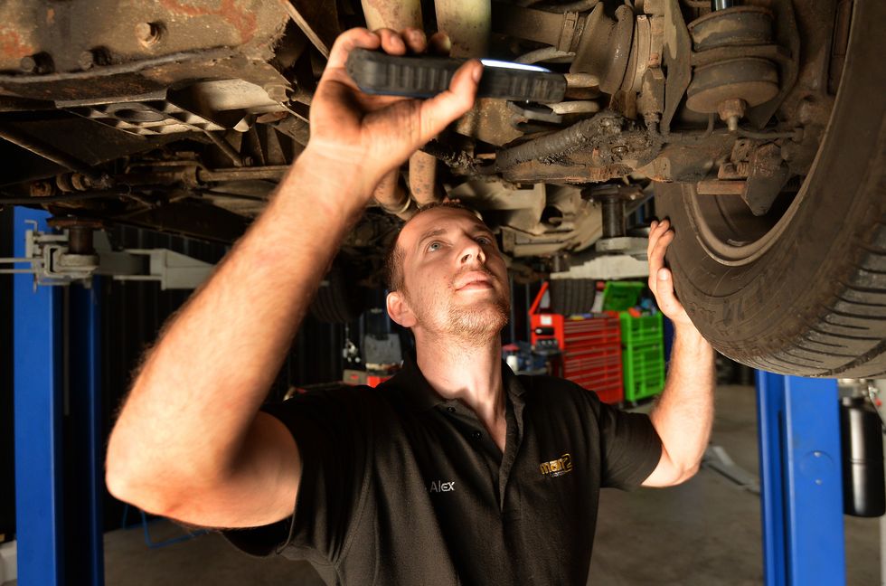 A mechanic doing an MOT test