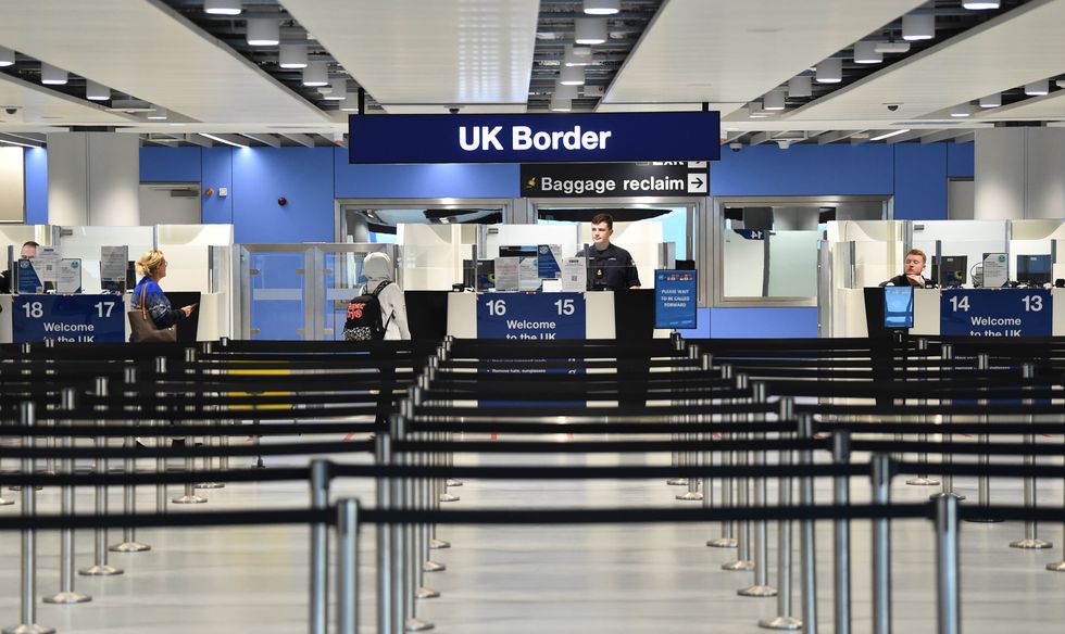 A member of the military at passport control at Manchester airport as they cover for striking Border Force officers. Public and Commercial Services union (PCS) members working as Border Force officers at Gatwick, Heathrow, Birmingham, Cardiff, Manchester and Glasgow airports and the port of Newhaven resumed strikes on Wednesday for four days over pay, jobs and conditions. Picture date: Thursday December 29, 2022.