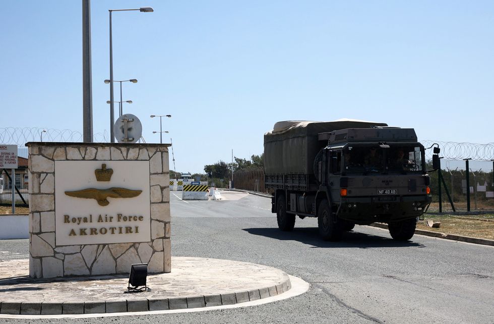 A military vehicle exits the gate of RAF Akrotiri, a Britsh military base in Cyprus