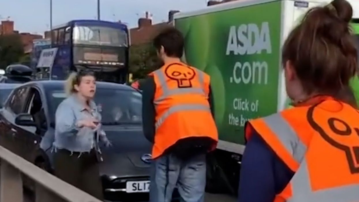 A mother berates a Just Stop Oil protester