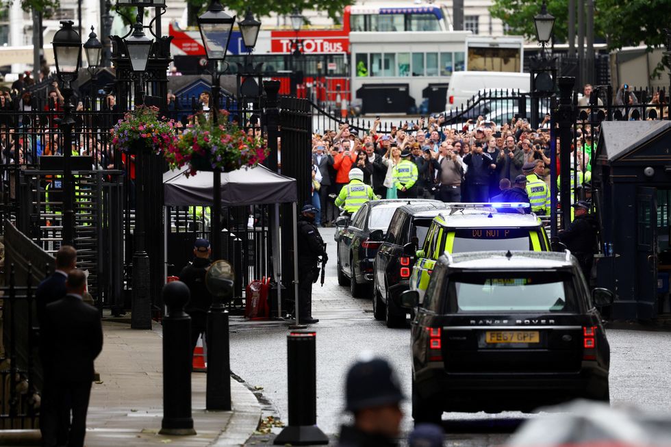 A motorcade takes Rishi Sunak away from Downing Street for the final time