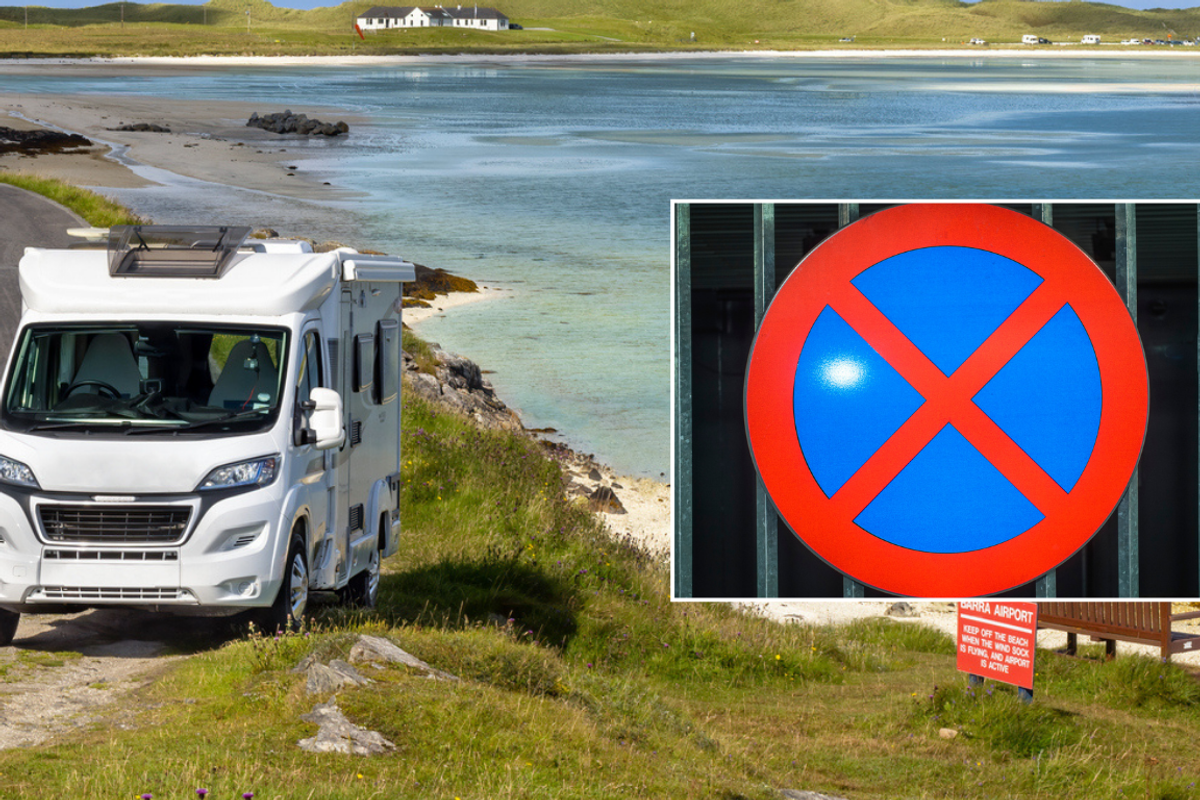 A motorhome and no parking sign