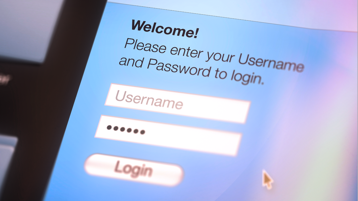 A mouse cursor hovers over the login button and password text field on a website