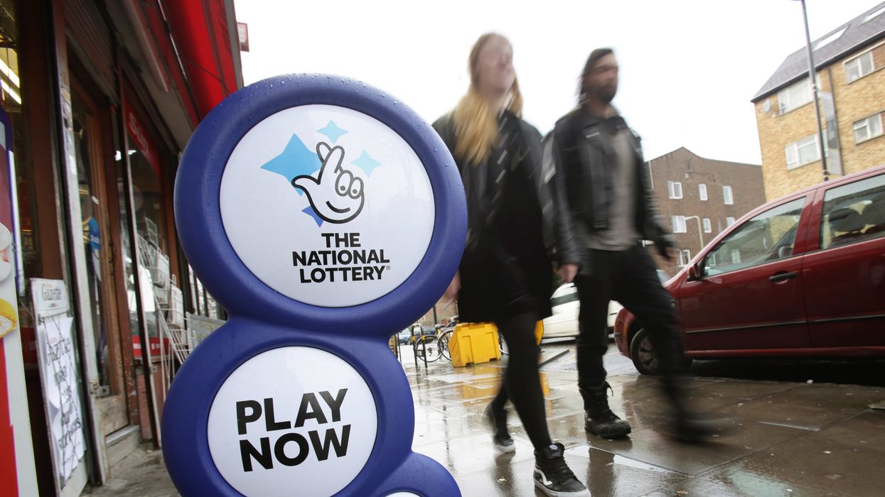 A National Lottery sign outside a newsagent in north London.