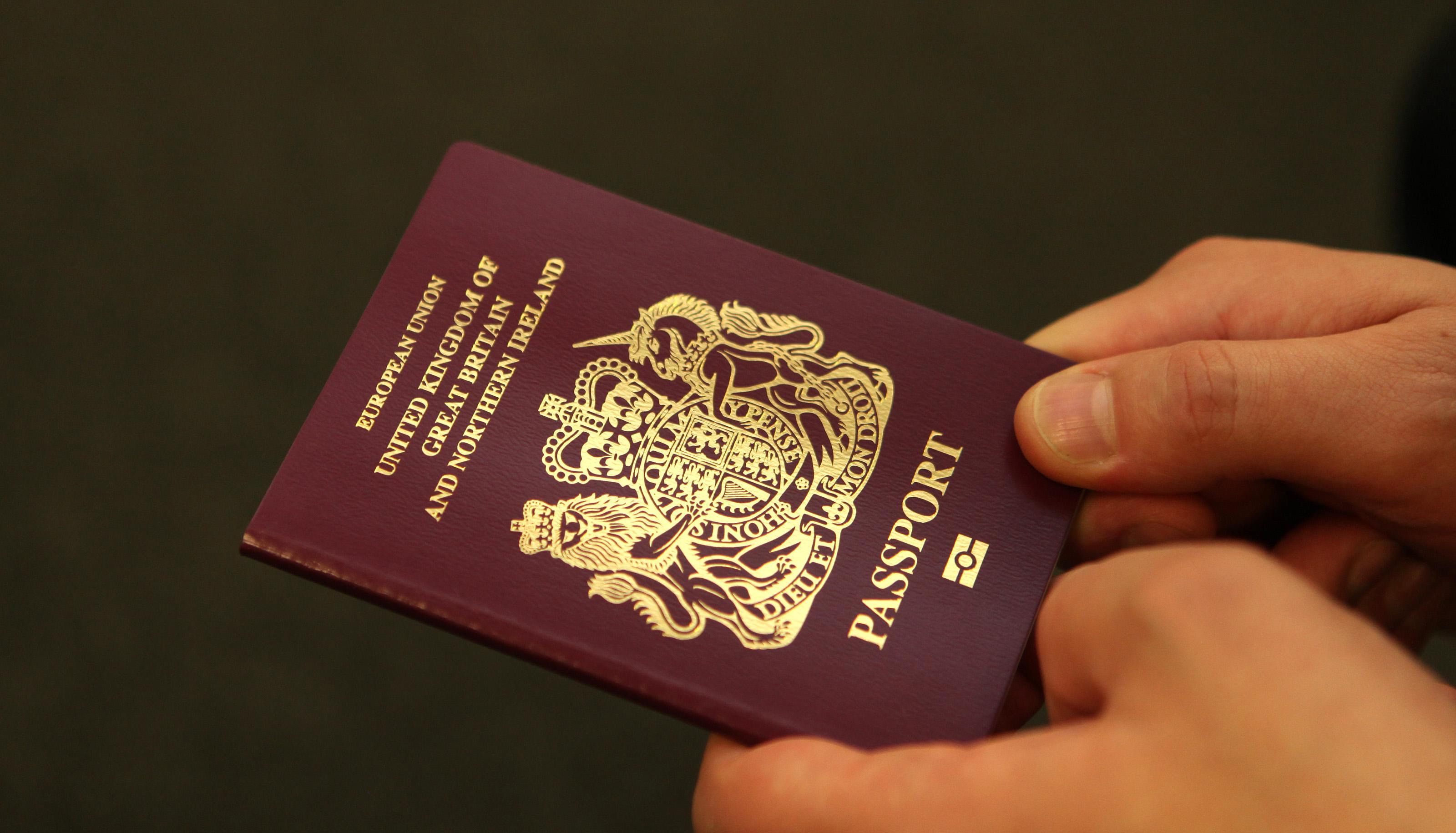 A new look passport from the counter of the London Passport Office, Victoria.