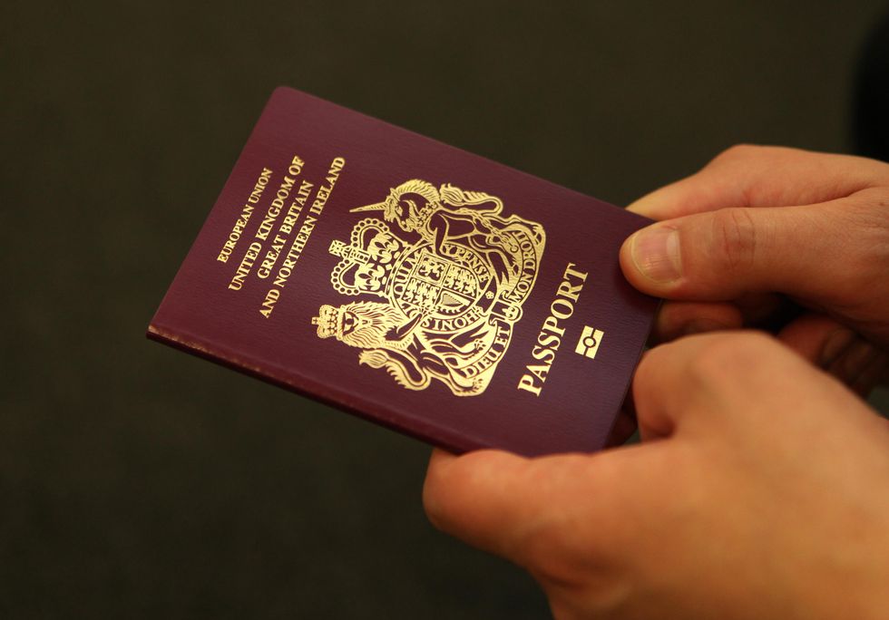 A new look passport from the counter of the London Passport Office, Victoria.