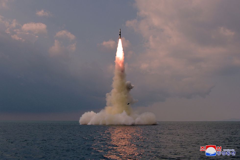 A new submarine-launched ballistic missile is seen during a test in this undated photo released on October 19, 2021 by North Korea's Korean Central News Agency (KCNA).