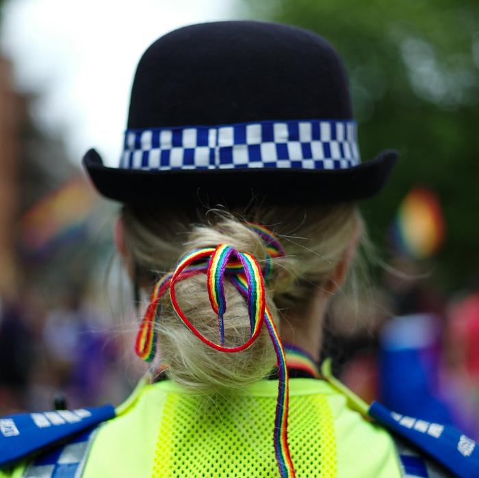 A North Yorkshire Police officer wears a rainbow shoelace in her hair during York Pride