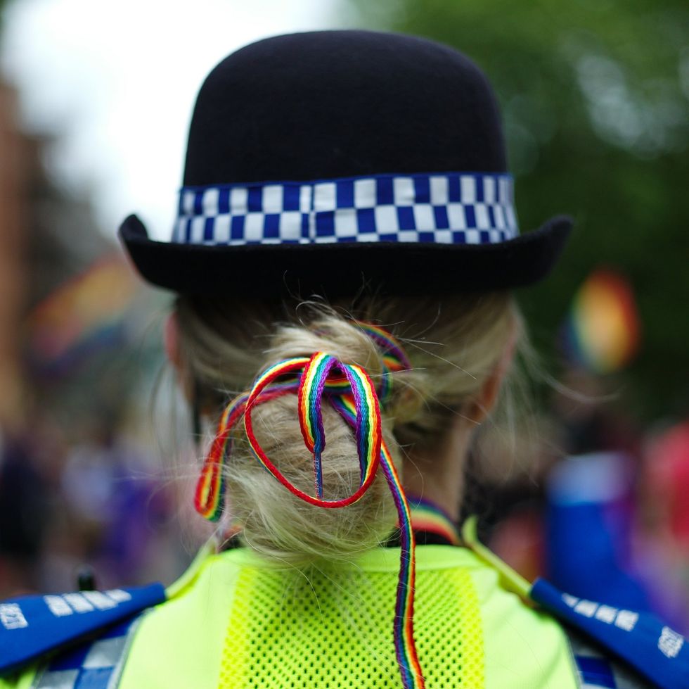 A North Yorkshire Police officer wears a rainbow shoelace in her hair during York Pride