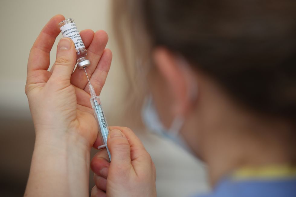 A nurse preparing a Covid-19 vaccine.