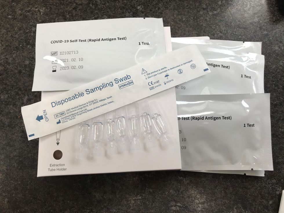 A package of seven NHS Test and Trace COVID-19 self-testing kits (Rapid Antigen Test) which has been received through the mail after ordering online for use at home. To help stop the spread of the virus the Government has introduced asymptomatic testing for certain people without symptoms who are being asked to check whether they are infected with the virus. Picture date: Monday March 8, 2021.