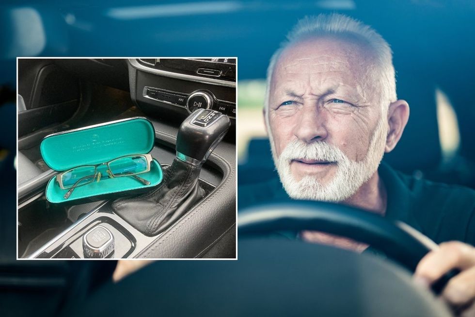 A pair of glasses in a car and an elderly driver squinting