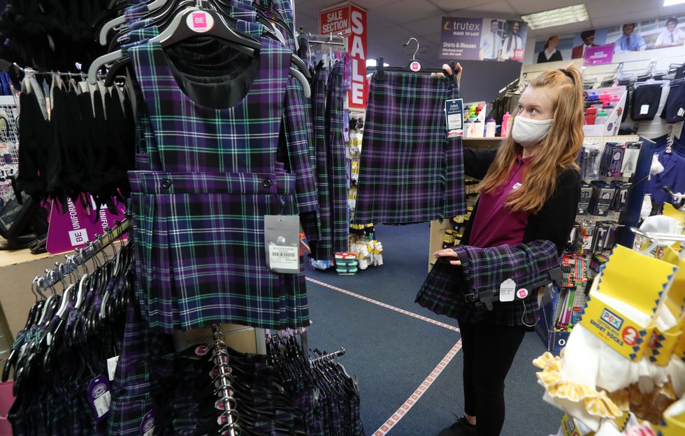 A parent buying a uniform