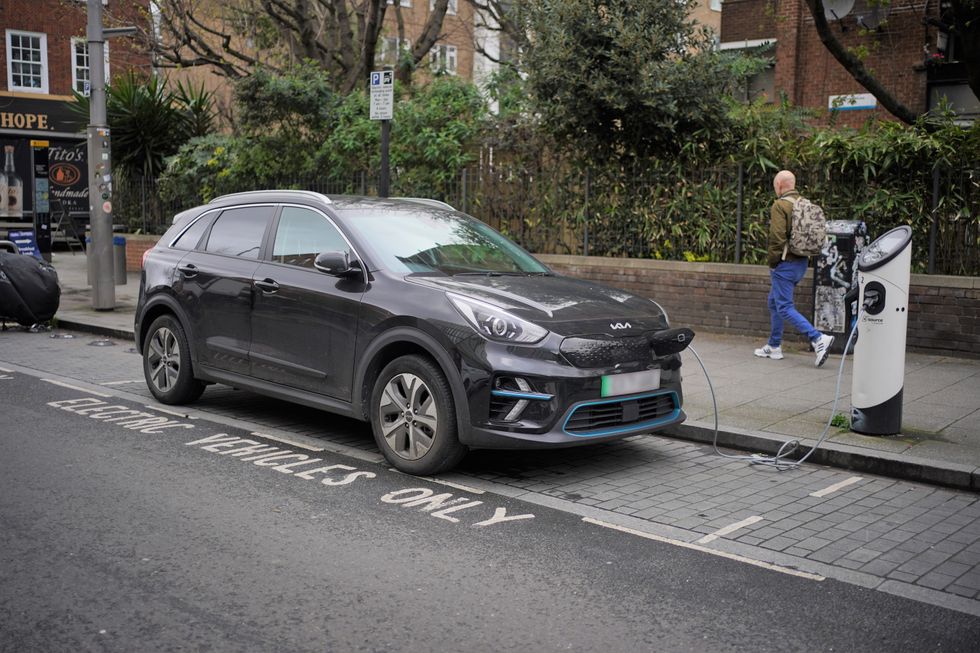A parked electric car charging