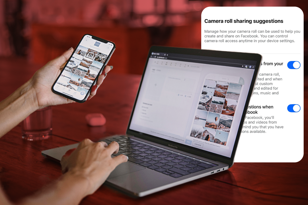 a person checks their phone and laptop for photos