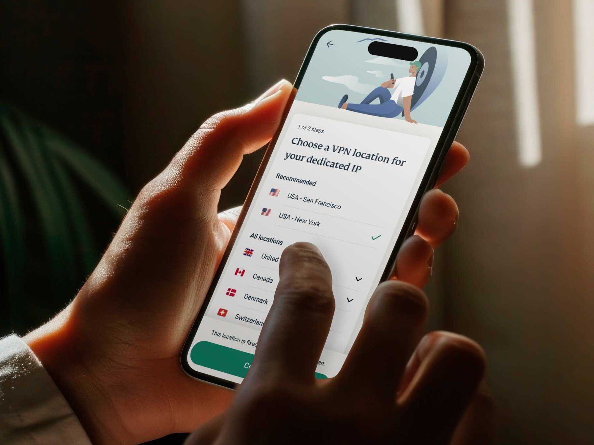 a person holds the expressvpn app on iPhone