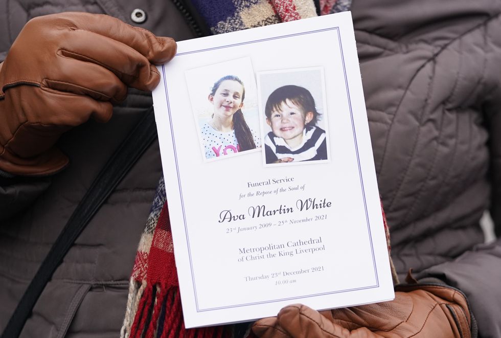 A person holds the order of service at Liverpool Metropolitan Cathedral ahead of the funeral of Ava White, 12, who was fatally stabbed in Liverpool city centre on November 25.