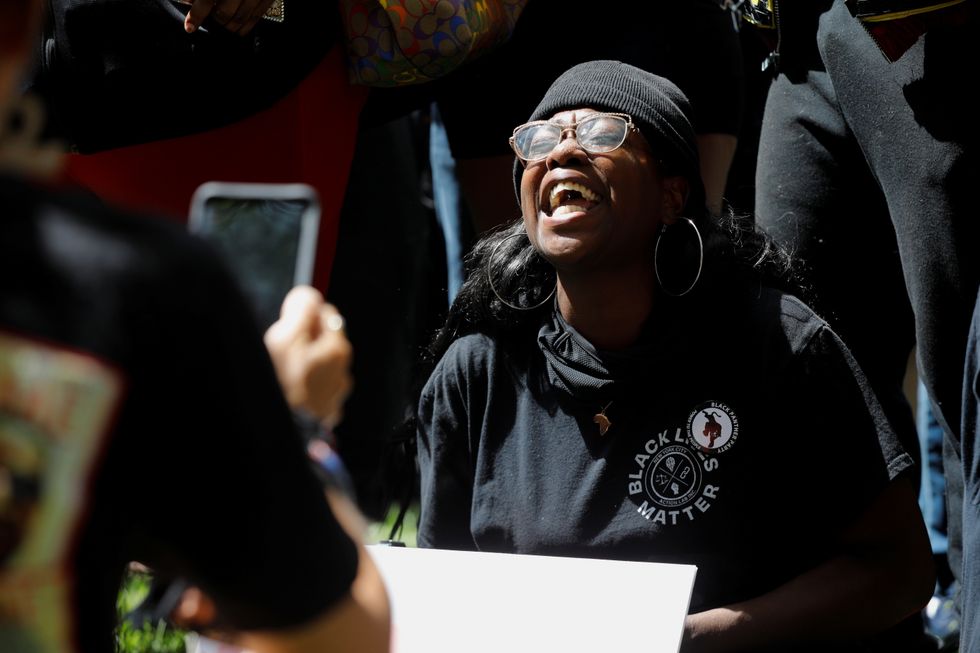 A person reacts outside Hennepin County Government Center after the sentence on former police officer Derek Chauvin