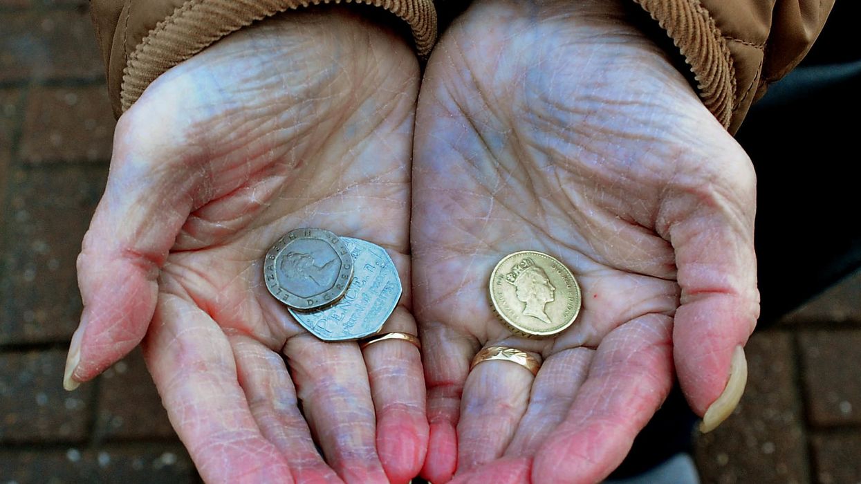 A person shows coins