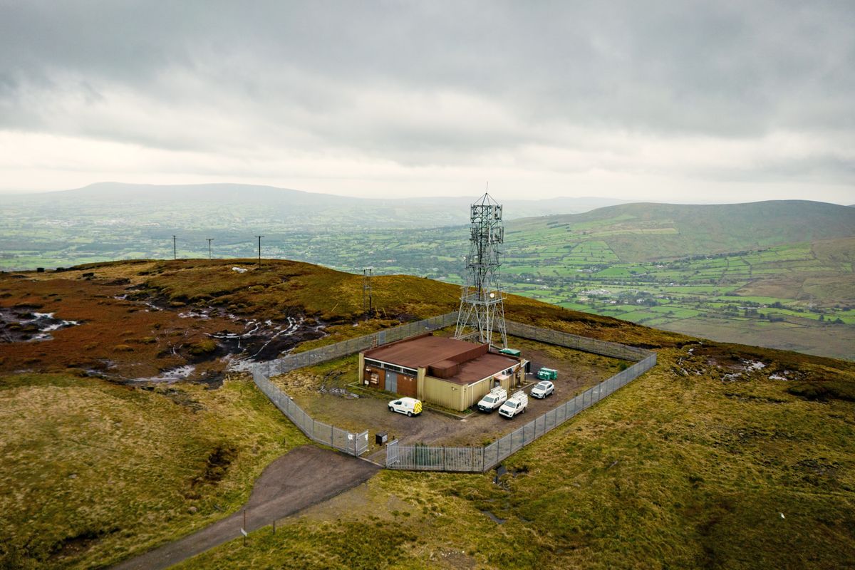 a photograph of an EE mast in a rural area
