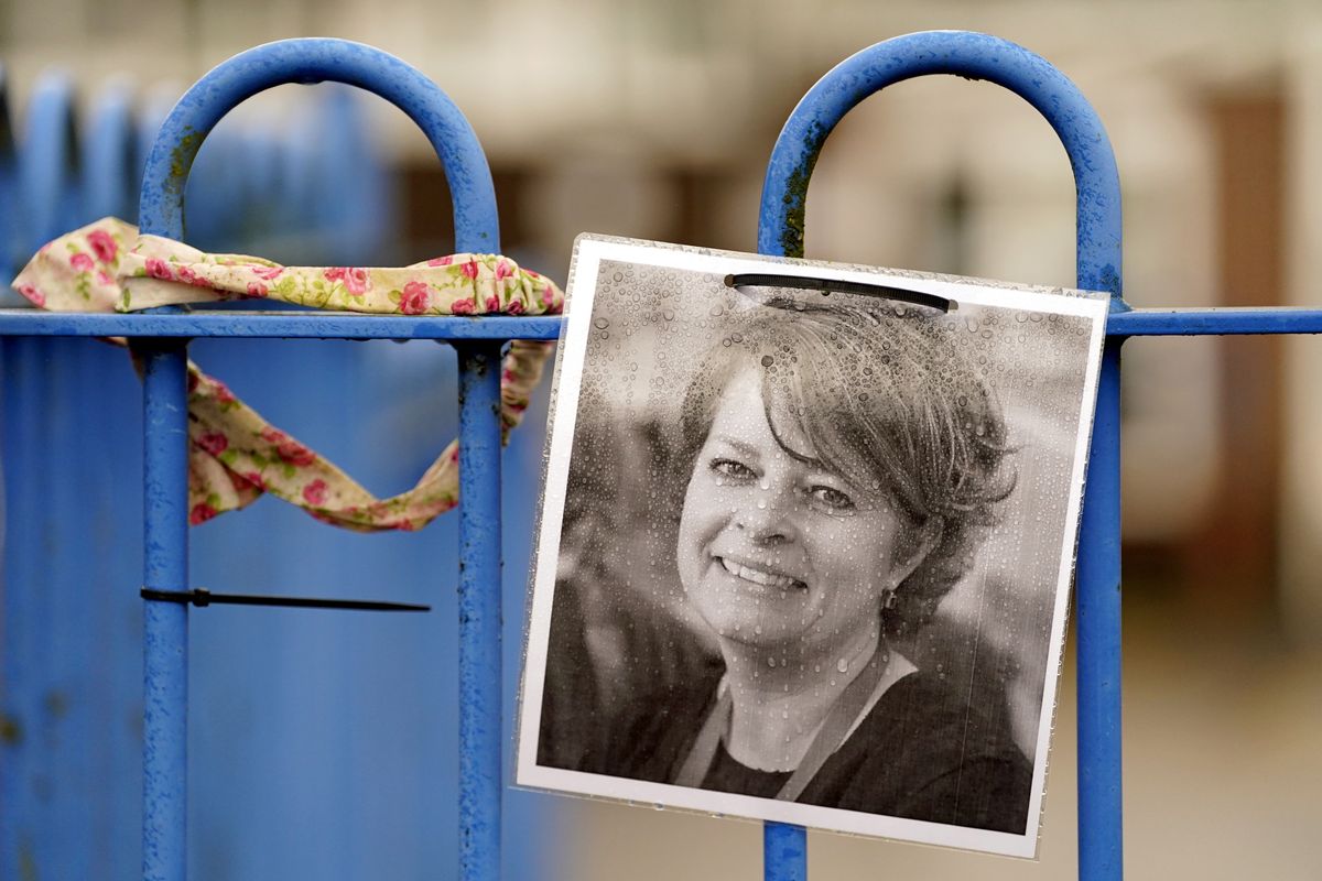 A photograph of Ruth Perry attached to the fence outside John Rankin Schools in Newbury