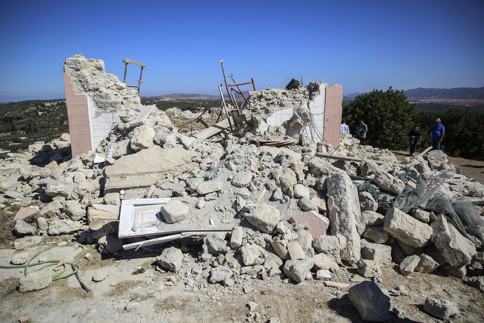 A photograph shows the rubble of a church following an earthquake, in Arkalochori village on the Crete island, on September 27, 2021