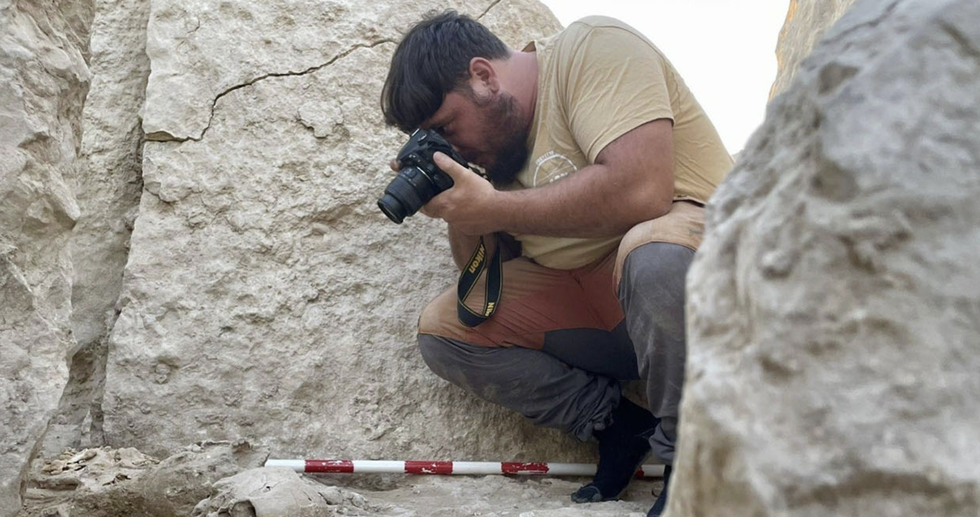 A photographer working at the scene