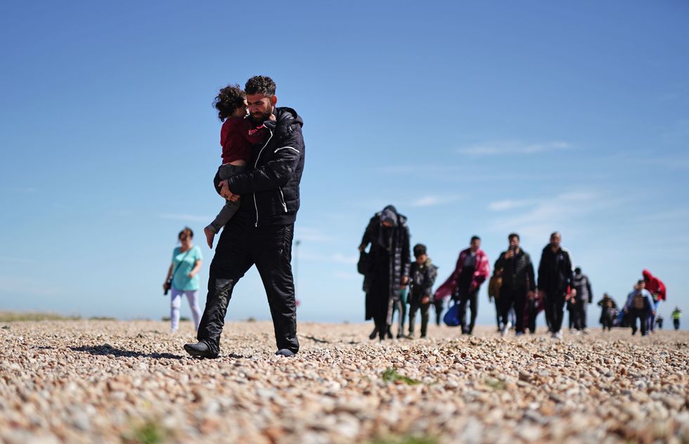 A picture of Channel crossing migrants arriving in Kent