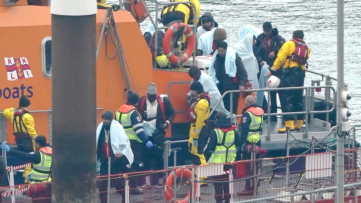 A picture of migrants arriving on the Kent coast