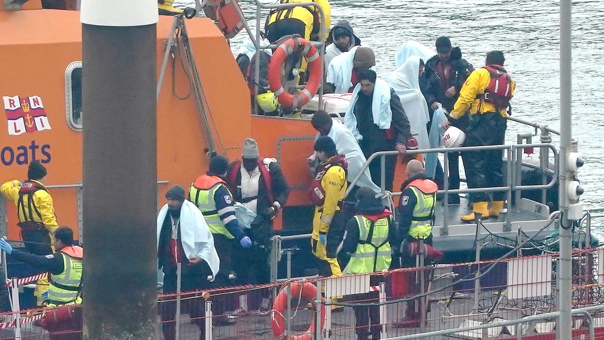 A picture of migrants arriving on the Kent coast