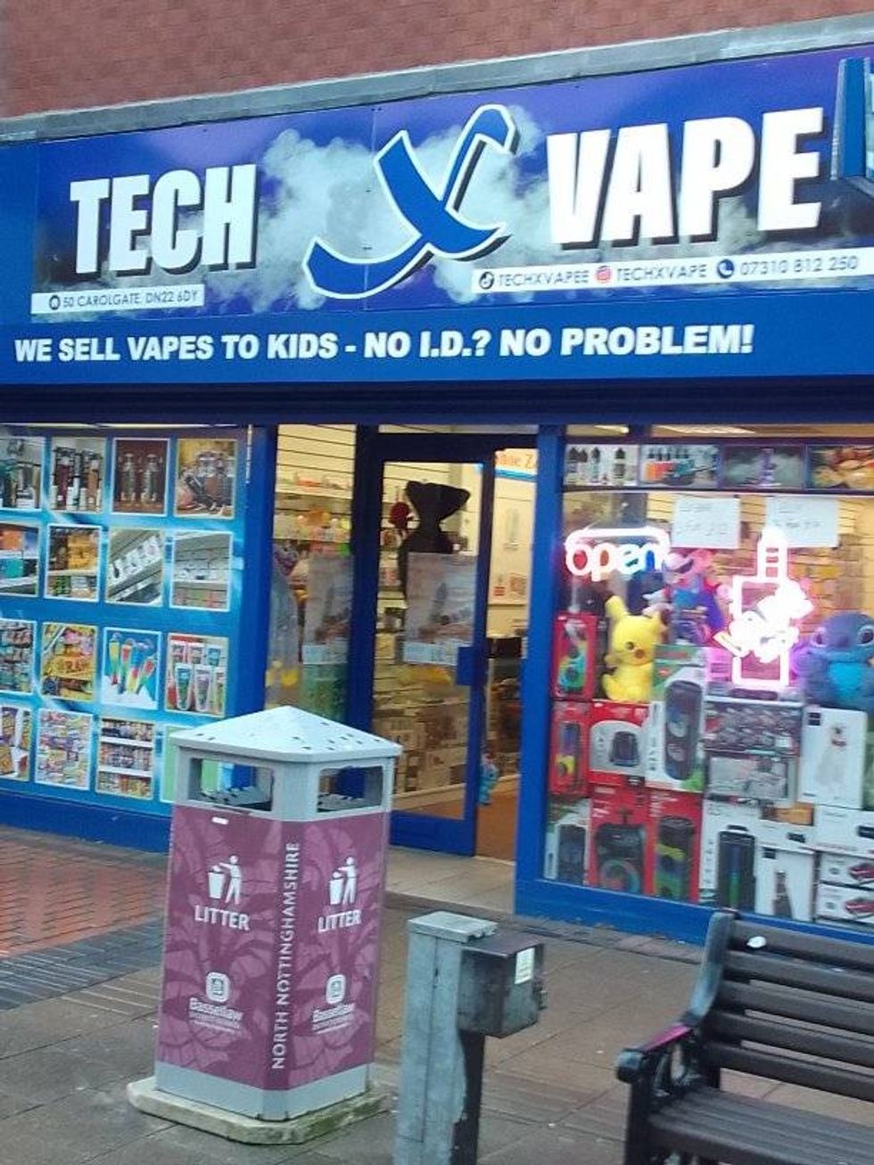 Nottinghamshire vape shop sign sparks outrage as banner boasting 'we sell  to kids' mysteriously appears overnight