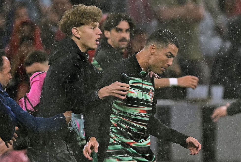 A pitch invader and Ronaldo