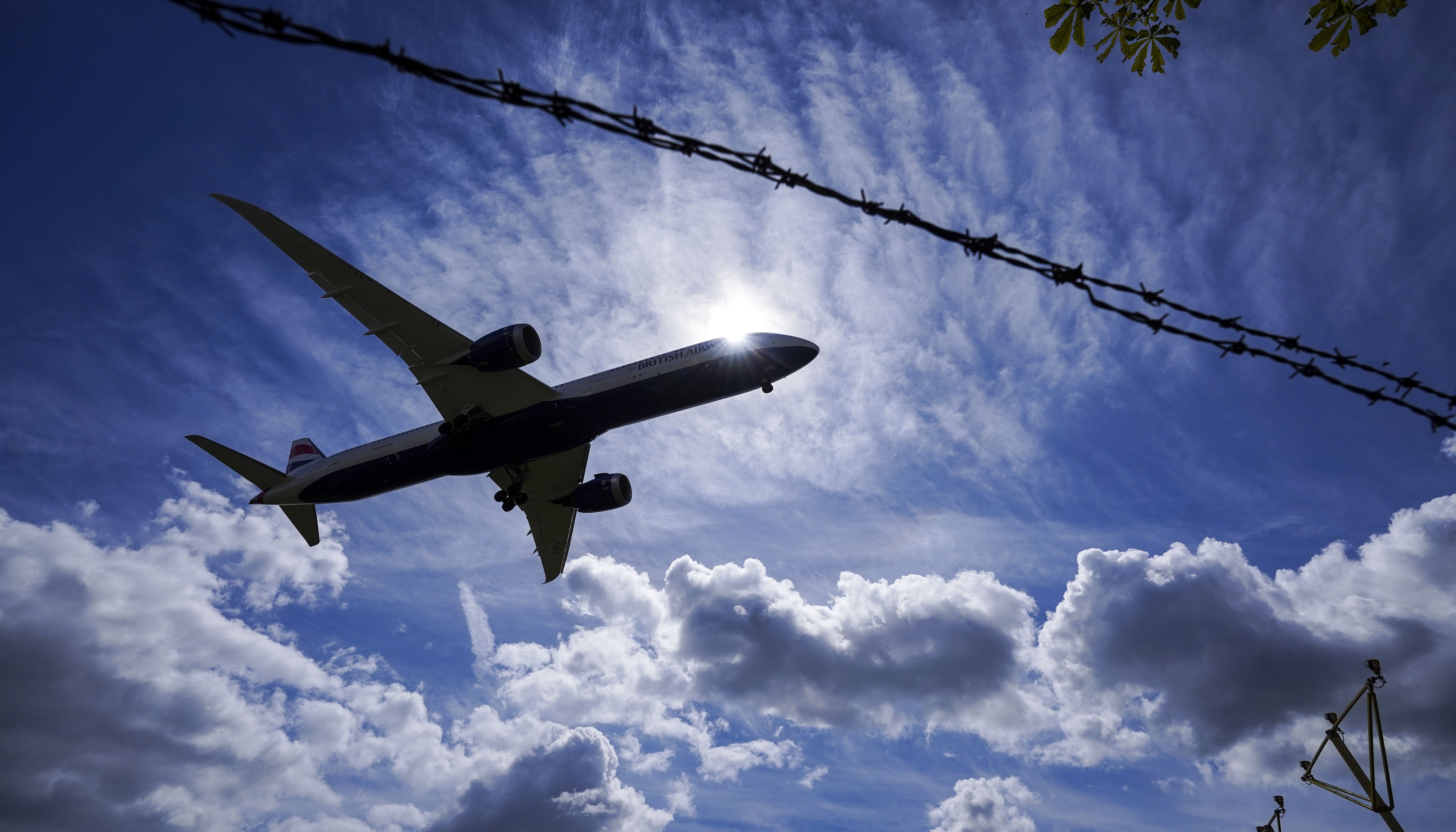 A plane lands on the southern runway at London Heathrow Airport.