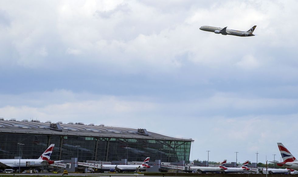 A plane takes off at Heathrow Airport, West London, as thousands of people have departed on international flights after the ban on foreign holidays was lifted for people in Britain.. Picture date: Monday May 17, 2021.