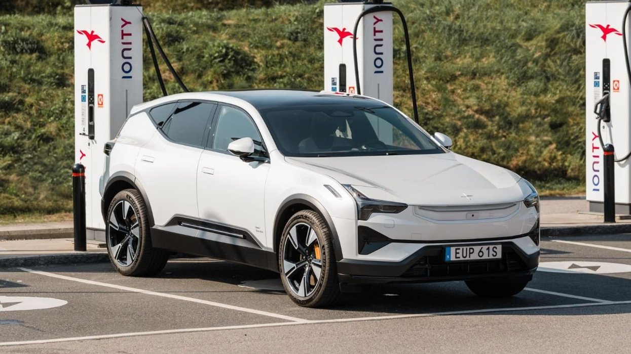 A Polestar electric vehicle charging in public