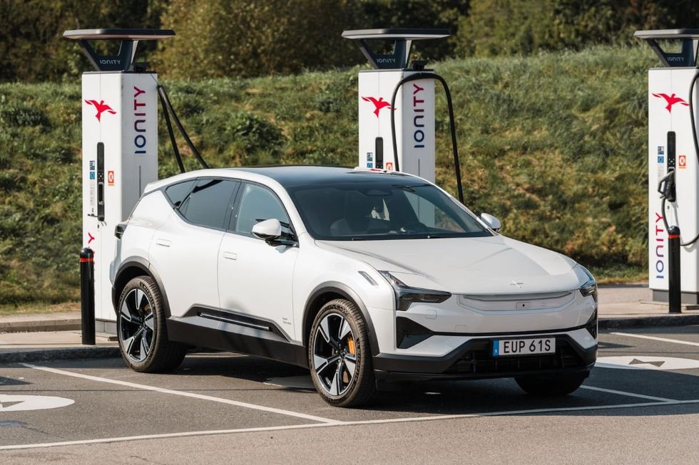 A Polestar electric vehicle charging in public